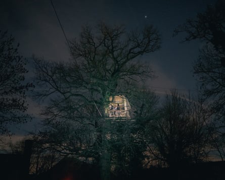 Activists prepare a tree house for eviction