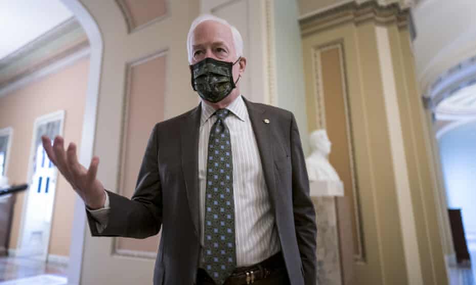 John Cornyn pauses outside the Senate chamber in Washington on Friday.