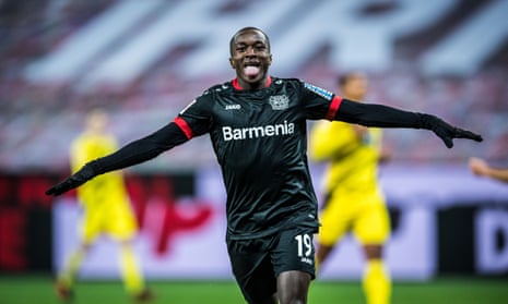 Moussa Diaby celebrates scoring Bayer Leverkusen’s first goal against Borussia Dortmund before later creating the winner for 17-year-old Florian Wirtz.