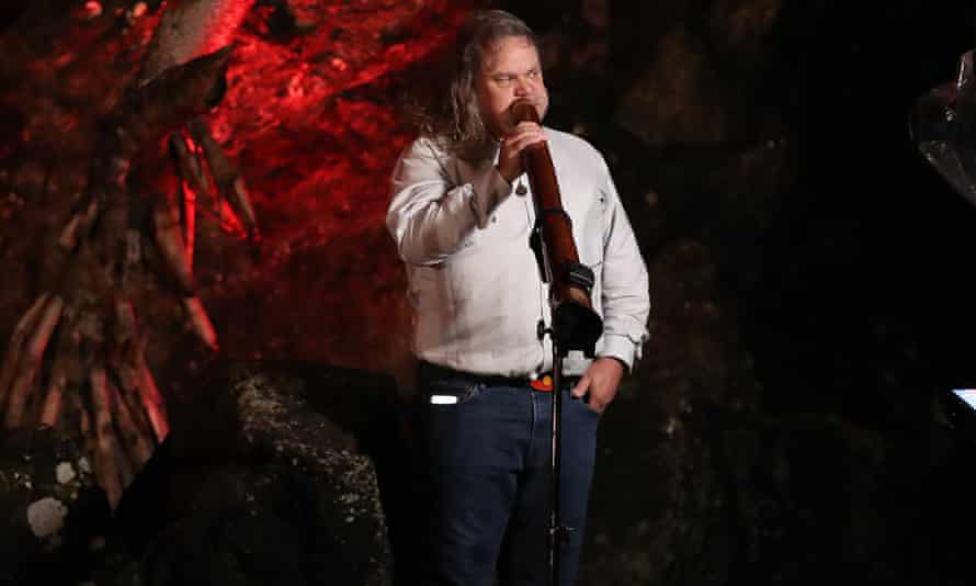 A didgeridoo is performed at the dawn service at Currumbin, during Anzac Day in Gold Coast, Monday, April 25, 2022.