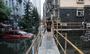 Vacuum Cleaners Zone Rain swamps China regions breaching dykes and causing landslides