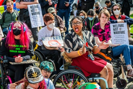 Disabled people at a protest outside parliament