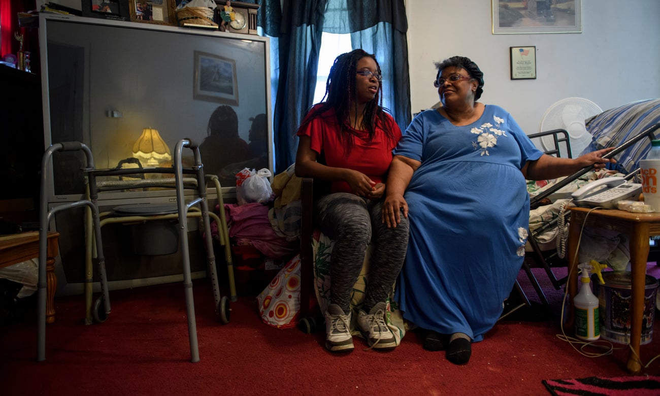 Henrietta Banks (right) and her daughter Nicole discuss the fallout of the closure of the Walmart in McDowell County.