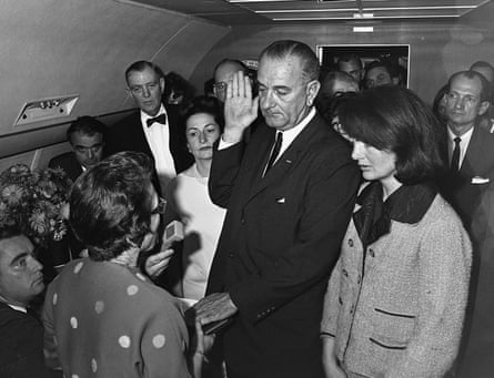 Lyndon Johnson takes the oath of office aboard Air Force One after President Kennedy’s assassination. Kennedy may have been planning to drop Johnson from the re-election ticket.