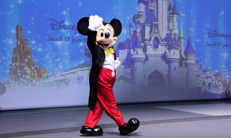Mickey Mouse waving toward the camera