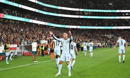 Cristiano Ronaldo celebrates a landmark goal in Lisbon.