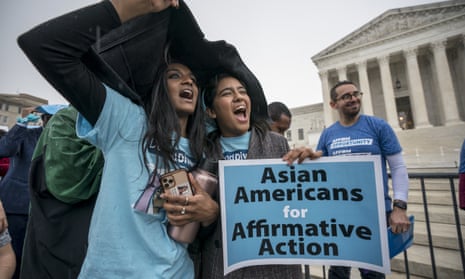 Harvard students Shruthi Kumar, left, and Muskaan Arshad, join a rally with other activists as the supreme court hears oral arguments on a pair of cases that could decide the future of affirmative action, on 31 October 2022. 