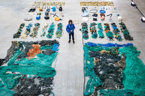 Boyan Slat, creator of the Ocean Cleanup project, with plastic caught by the system.