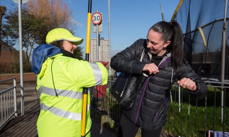One last elbow-tap at a school crossing in Glasgow before nationwide closures.