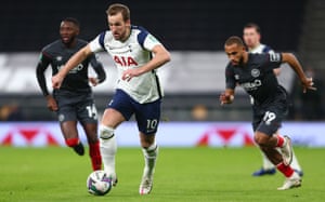 Tottenham Hotspur v Brentford: Carabao Cup semi-final – live! | Football 8 Spurs’ Harry Kane surges forward.