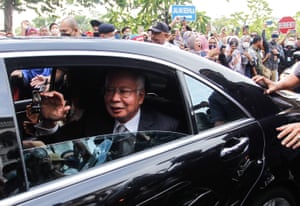 Malaysian prime minister Najib Razak arrives at the federal court in a car