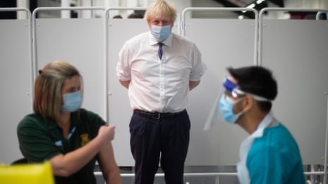 Boris Johnson warns of 'race against time' as 2.4 million vaccinated – video