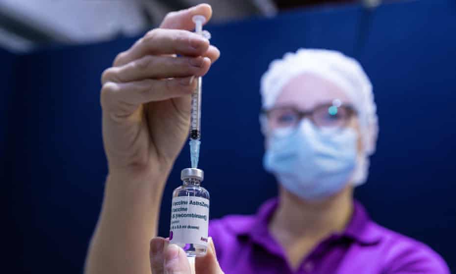 A nurse holds up a syringe containing the AstraZeneca Covid vaccine. GPs across Australia are hoping that the ramp up of manufacturing capacity of the jab in Melbourne will translate into an increase in vaccine supply delivered to doctors. 