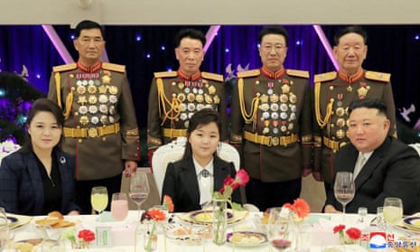 Daughter Kim Ju-ae is flanked by North Korean leader Kim Jong-un and his wife Ri Sol-ju at a banquet to celebrate the 75th anniversary of the founding of the military in Pyongyang on Tuesday.