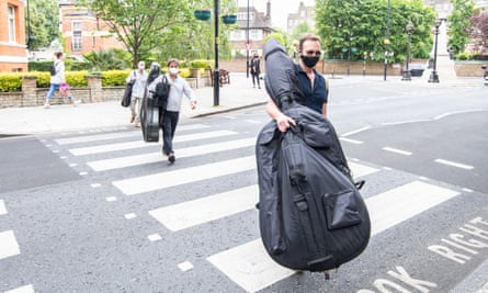 Royal Philharmonic Orchestra musicians arrive at Abbey Road Studios on 4 June 2020.