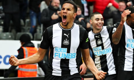 Isaac Hayden celebrates scoring with a late header for Newcastle against Chelsea.