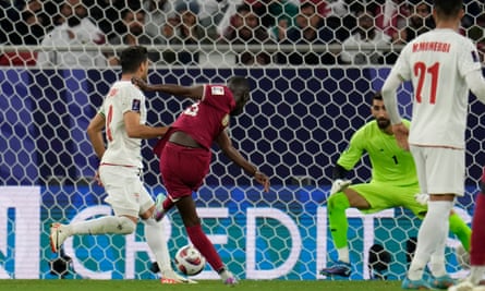 Almoez Ali scores Qatar’s winner against Iran in the semi-final