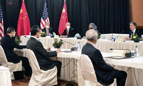 Secretary of State Antony Blinken, far right, speaks as Chinese Communist Party foreign affairs chief Yang Jiechi, left, and China's State Councilor Wang Yi, second from left, listen at the opening session of US-China talks at the Captain Cook Hotel in Anchorage, Alaska