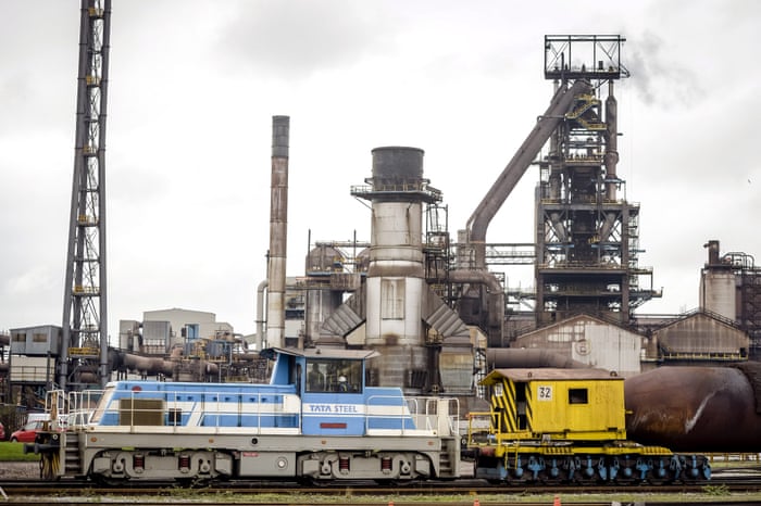 A train carrying molten iron in front of the steel factory building at the Tata steel plant in Port Talbot.