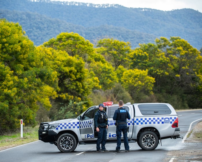 Man charged as search for accused Porepunkah police killer Dezi Freeman enters sixth day