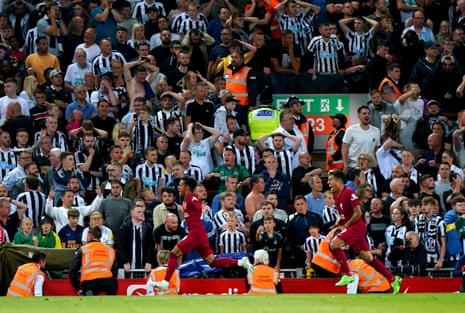 Newcastle United fans react as Liverpool’s Fabio Carvalho celebrates scoring his side’s last minute winner.