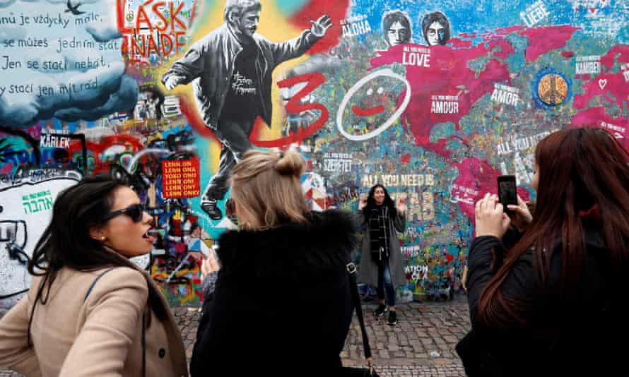 The Lennon Wall, one of Prague’s most popular attractions, is covered with graffiti and obscene messsages.