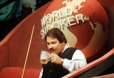 Bill Werbeniuk takes drink from a pint glass during a match