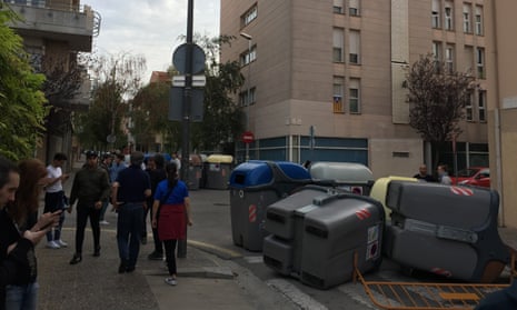 These bins have been used as barricades outside a school in the centre of Girona.
