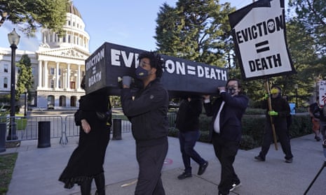 Demonstrators carried a mock casket past California’s capitol in January.