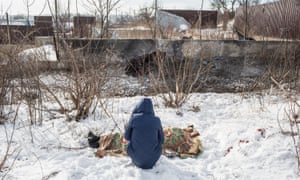Nadiya Volkova, 24, grieves for her mother Katya Volkova, 60, killed by shelling.