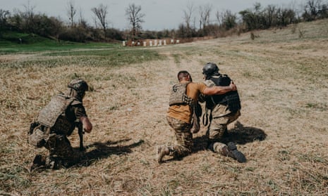 Three soldiers on a firing range in Ukraine