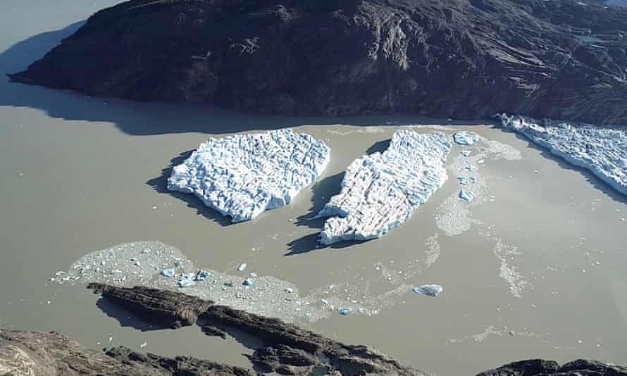 Two new icebergs break off from the Grey glacier in Patagonia, Chile on 9 March.