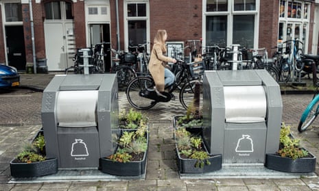 The mini-gardens will be trialled around street bins over the next three months in Amsterdam.