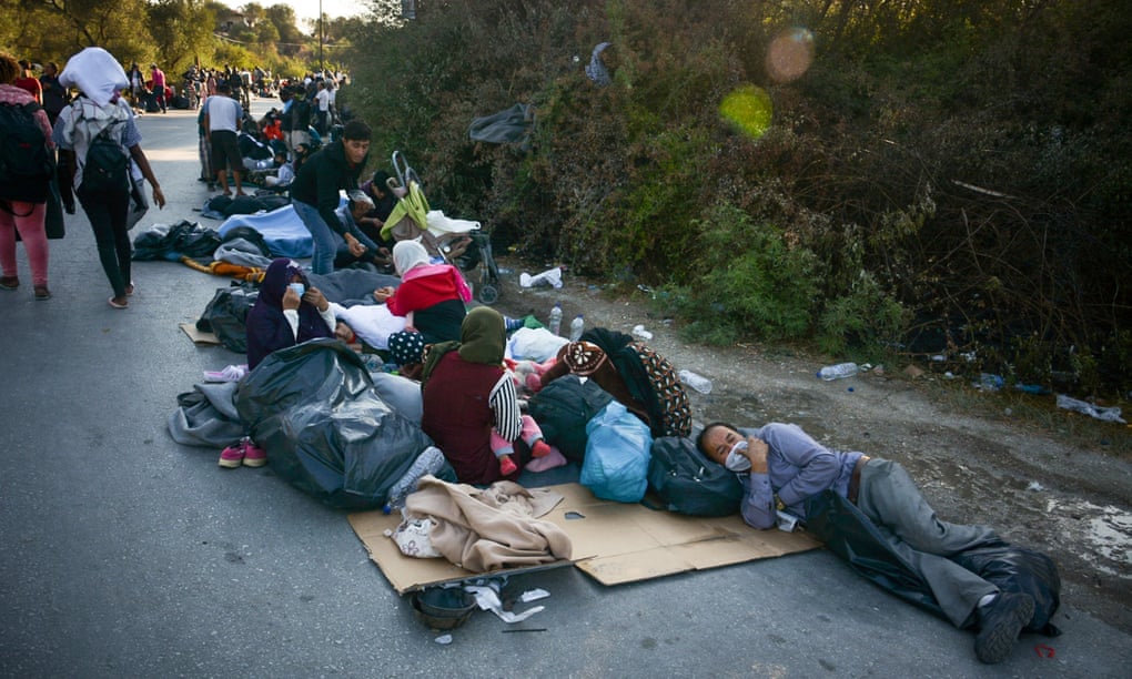 Homeless refugees camp on a road in Lesbos, after Moria camp was ravaged by fire. 