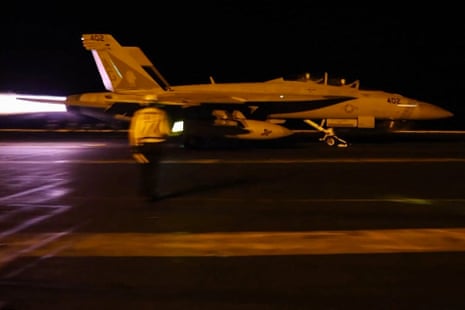 US plane on aircraft carrier deck