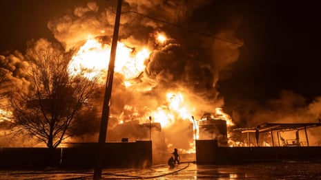 Fire rips through buildings in Kharkiv after Russian drone attack – video