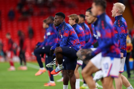 Marc Guehi and his Crystal Palace teammates warm up prior to the Carabao Cup fourth round match against Liverpool.