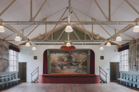 A hall with a stage at the back