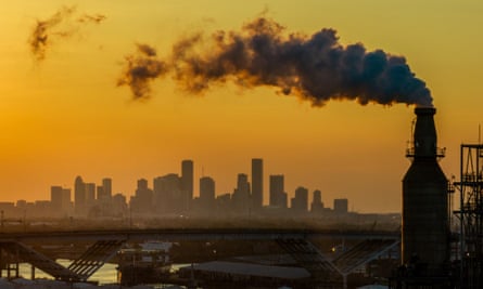 Smoke billows from the Valero refinery across the Houston skyline in Texas