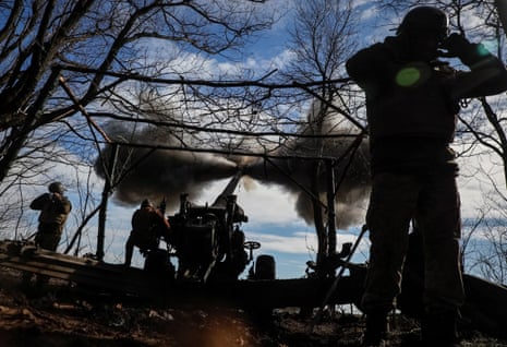 Ukrainian service members fire a shell from a towed howitzer FH-70 at a front line in Zaporizhzhia region.
