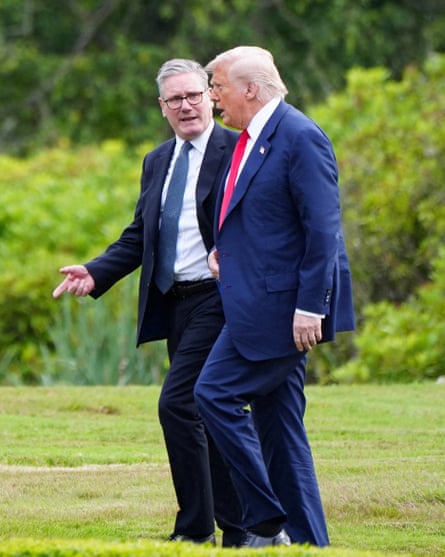 The British prime minister, Keir Starmer, and the US president, Donald Trump, talk during a summit at a Trump golf course in Scotland