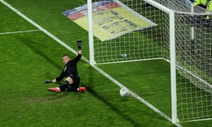 Tammy Abraham of Aston Villa marks the winning penalty from the legs of goalkeeper Baggies Sam Johnstone.