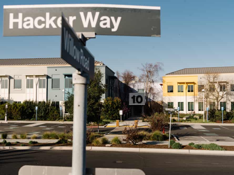 facebook headquarters with sign that says 'hacker way'