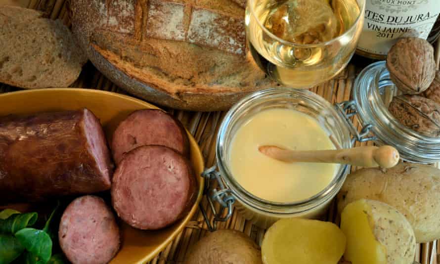 Franche-Comté specialties including cancoillotte cheese and saucisse de Morteau.