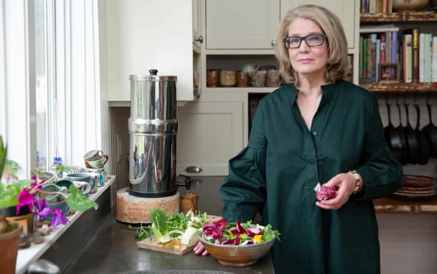 Emily Nunn in kitchen, making a salad