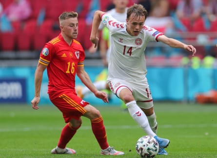 Mikkel Damsgaard breaks away from Joe Morrell during Denmark’s Euro 2020 win over Wales.