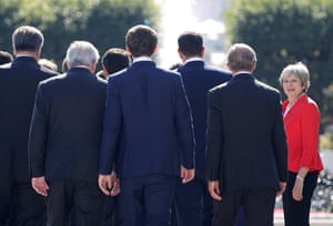 May arrives for a group photo during the informal summit of European Union leaders in Salzburg, Austria