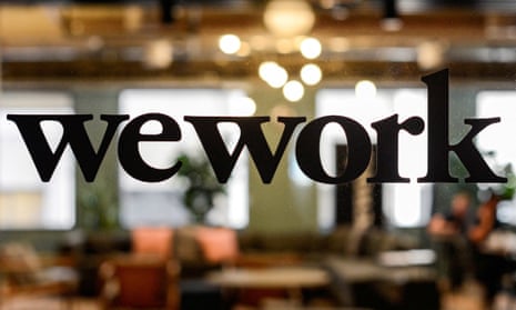 A WeWork logo is seen at a WeWork office in San Francisco, California.