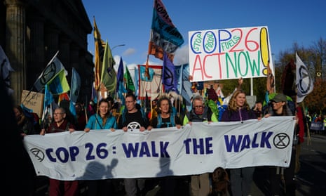 Pilgrimage groups who have walked to Glasgow are joined by members of the group Extinction Rebellion as they walk to raise awareness of the climate crisis on October 30, 2021. The protest forms part of a series of events to be held throughout the COP 26 climate summit
