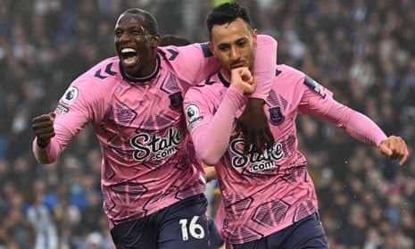 Everton midfielder Dwight McNeil (right) celebrates with Abdoulaye Doucouré after scoring their fourth goal against Brighton.